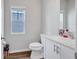 Clean bathroom features a modern vanity, toilet, and natural light at 12710 Hysmith Loop, Parrish, FL 34219
