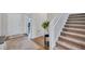Spacious entryway with a staircase and decorative plant at 12710 Hysmith Loop, Parrish, FL 34219