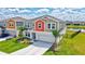 Charming two-story home with a pond view, and well-manicured lawn at 12710 Hysmith Loop, Parrish, FL 34219