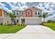 Charming two-story home with a well-manicured lawn and spacious driveway at 12710 Hysmith Loop, Parrish, FL 34219