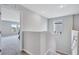 Neutral toned stairway leading to the upper level of the home at 12710 Hysmith Loop, Parrish, FL 34219