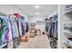 The walk-in closet offers generous space and shelving for optimal organization at 12710 Hysmith Loop, Parrish, FL 34219