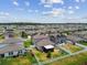 An aerial view of a well-planned community highlighting the fenced backyards at 13529 Wild Ginger St, Riverview, FL 33579