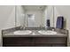 Bathroom featuring granite countertops and dual sinks at 13529 Wild Ginger St, Riverview, FL 33579
