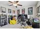 This bedroom features carpeted floors, ceiling fan, and Star Wars themed decor at 13529 Wild Ginger St, Riverview, FL 33579