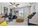 Bedroom featuring a ceiling fan, carpet and window at 13529 Wild Ginger St, Riverview, FL 33579