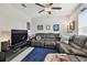 Cozy living room with neutral color pallet, plush carpeting, and ample natural light at 13529 Wild Ginger St, Riverview, FL 33579