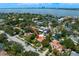An aerial shot shows the neighborhood and the city from above at 136 W Davis Blvd, Tampa, FL 33606