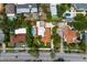 An aerial shot shows the neighborhood and the city from above at 136 W Davis Blvd, Tampa, FL 33606