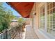 Outdoor balcony with a red awning, decorative planters, and wrought iron railing at 136 W Davis Blvd, Tampa, FL 33606