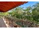 Outdoor balcony with a red awning, decorative planters, and wrought iron railing at 136 W Davis Blvd, Tampa, FL 33606