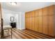 Hallway featuring a wall of storage and access to a bathroom with modern vanity at 136 W Davis Blvd, Tampa, FL 33606