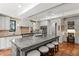 Spacious kitchen with granite island, stainless appliances, and custom cabinetry at 136 W Davis Blvd, Tampa, FL 33606