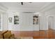 Living room boasting built-in storage, wood floors, and abundant natural light at 136 W Davis Blvd, Tampa, FL 33606