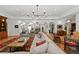Bright living room with tile floors, columns, and neutral tones create an inviting atmosphere at 136 W Davis Blvd, Tampa, FL 33606