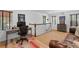 Comfortable room featuring a desk, lounge space, and window views at 136 W Davis Blvd, Tampa, FL 33606