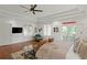 Spacious bedroom with hardwood floors, tray ceilings, and an abundance of natural light at 136 W Davis Blvd, Tampa, FL 33606