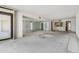 Living Room featuring sliding glass door and views of kitchen at 1400 Gulf Blvd # 306, Clearwater Beach, FL 33767