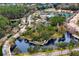 An aerial view highlighting the community's layout with ponds, green spaces, and residential properties at 14851 Tudor Chase Dr, Tampa, FL 33626