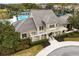 Aerial view of the luxury community clubhouse, with meticulous landscaping at 14851 Tudor Chase Dr, Tampa, FL 33626