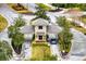 View of the gated community entrance with well-manicured landscaping at 14851 Tudor Chase Dr, Tampa, FL 33626