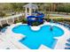 Aerial view of the community pool and water slide, perfect for Gathering fun at 14851 Tudor Chase Dr, Tampa, FL 33626