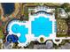 Aerial view of the resort-style pool featuring a slide and ample seating at 14851 Tudor Chase Dr, Tampa, FL 33626