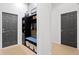 Mud room featuring bench seating, storage cubbies, and coat hooks providing an organized space for coats and shoes at 14851 Tudor Chase Dr, Tampa, FL 33626