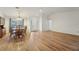 Spacious dining area showcases hardwood floors and large windows at 1624 Shady Leaf Dr, Valrico, FL 33596