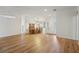 Open-concept dining area boasts hardwood floors at 1624 Shady Leaf Dr, Valrico, FL 33596