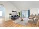 Bright living room with hardwood floors and sliding glass doors at 1624 Shady Leaf Dr, Valrico, FL 33596