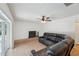 Living room featuring tile floors, sliding glass door, and fireplace at 1624 Shady Leaf Dr, Valrico, FL 33596