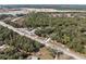 Expansive property with surrounding greenery and road access, offering development opportunities at 16519 Us Highway 41, Spring Hill, FL 34610