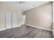Bedroom with gray flooring and closet at 16519 Us Highway 41, Spring Hill, FL 34610