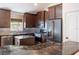 Beautiful kitchen with stainless steel appliances, granite countertops, and modern cabinetry at 2008 Berry Lake Dr, Brandon, FL 33510