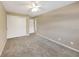 Enjoy this sizable bedroom that provides plush carpets, a ceiling fan, and convenient access to other rooms at 2048 Los Lomas Dr, Clearwater, FL 33763