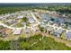 Beautiful aerial view of a residential community featuring lakes, golf course and well-maintained lawns at 2258 Preservation Green Ct, Sun City Center, FL 33573