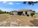 Expansive backyard with lush landscaping and mature shrubbery offering privacy at 2258 Preservation Green Ct, Sun City Center, FL 33573