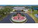 An aerial view shows Sun City Center Veterans Memorial in front of the community hall at 2258 Preservation Green Ct, Sun City Center, FL 33573