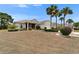 Charming one-story home featuring mature landscaping and a screened in porch at 2258 Preservation Green Ct, Sun City Center, FL 33573