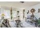 Bright living room with tile flooring, large window, and decorative wall art at 2308 18Th E St, Bradenton, FL 34208