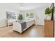 Bright living room with a neutral color scheme and wood floors at 3106 Ash Ct, Dunedin, FL 34698