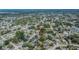 An aerial view showcases the property's location within a residential community, highlighted with a red arrow at 3344 Blythe Ave, Spring Hill, FL 34609
