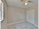 Lovely bedroom offering marble floors, fresh paint, and a ceiling fan at 3344 Blythe Ave, Spring Hill, FL 34609