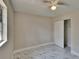 Empty bedroom with light colored walls, marble floors, and a closet at 3344 Blythe Ave, Spring Hill, FL 34609