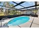 This beautiful screened-in pool is the perfect place to enjoy the Florida weather at 3344 Blythe Ave, Spring Hill, FL 34609