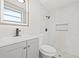 Modern bathroom with sleek vanity and a tiled walk-in shower at 3431 Springfield Dr, Holiday, FL 34691