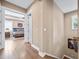 Upper hallway with hardwood floors provides access to the bedrooms at 3611 W Royal Palm Cir, Tampa, FL 33629