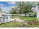 Spacious backyard with an unpainted deck and partial fence surround, great for relaxation at 3876 Crossline Dr, Spring Hill, FL 34609