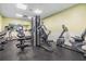 Well-equipped fitness center with modern exercise machines and mirrored walls at 3876 Crossline Dr, Spring Hill, FL 34609